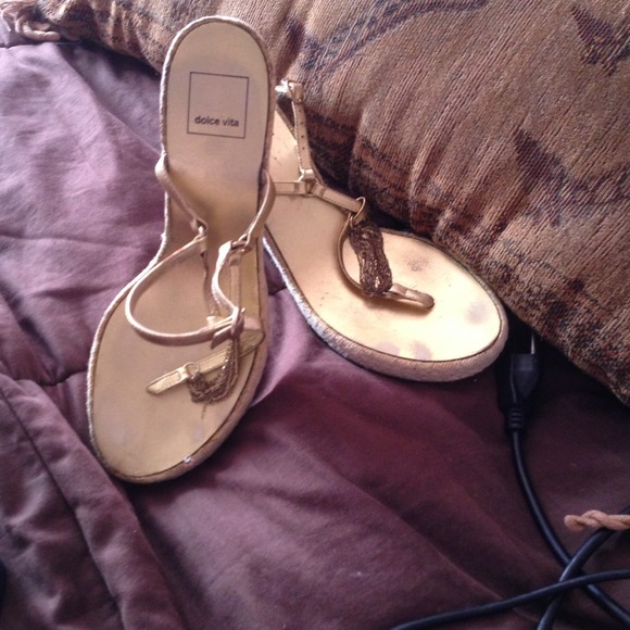 Gold wedge sandals with gold accent chains
