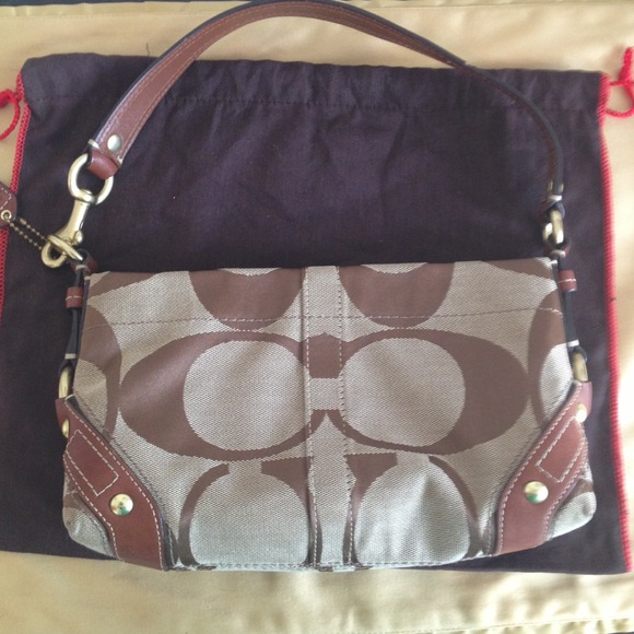 *Reserved* Authentic Coach signature handbag