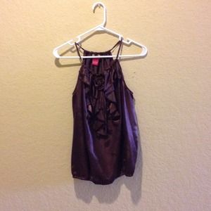 A brown silky like material top