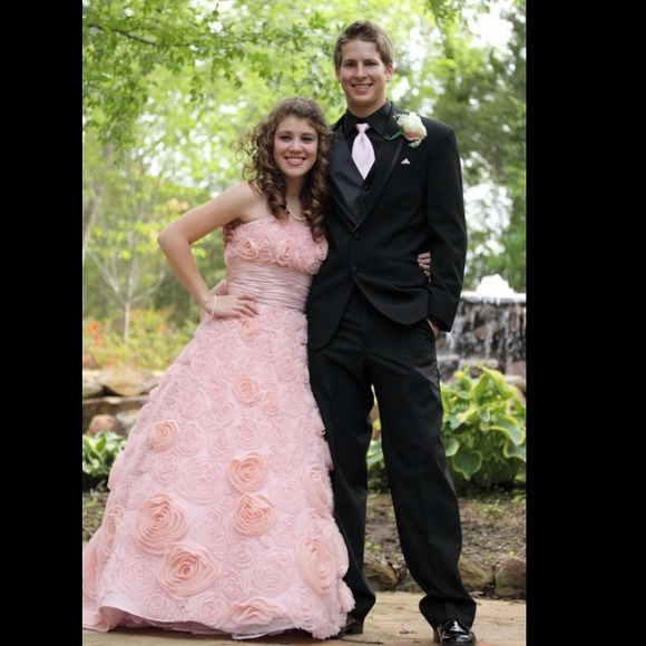 Light pink strapless prom dress.