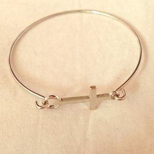 Silver cross wire bracelet.