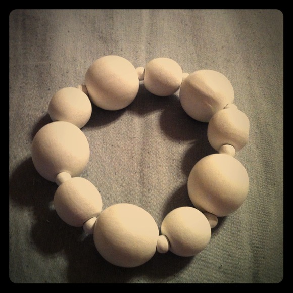 SOLD!!!!! Wooden beaded bracelet. White in color.