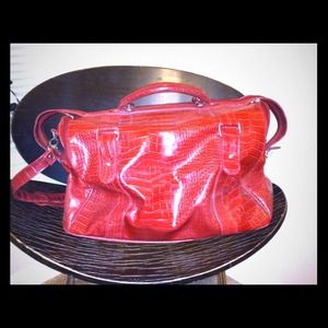 Red faux alligator duffel
