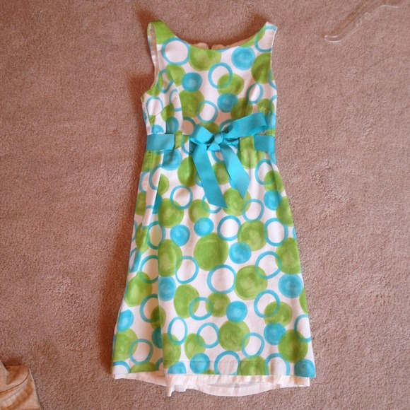 White dress with blue and green Polkadots