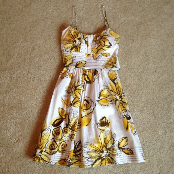 White dress with yellow and brown flowers