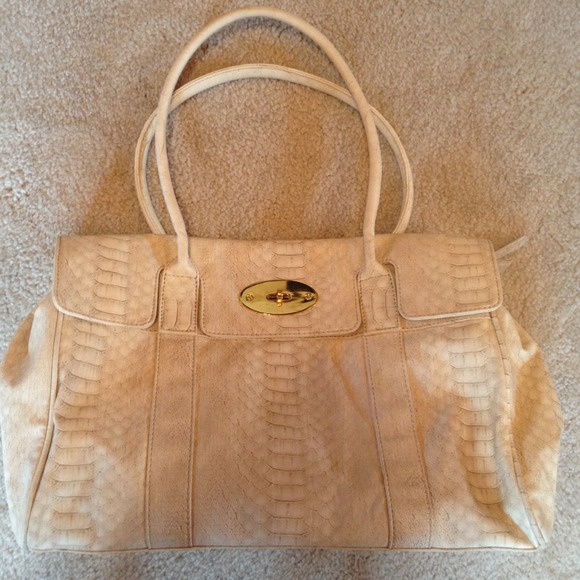 Tan snake pattern purse