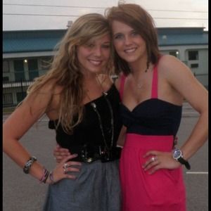 Navy and pink top has cute side pockets!