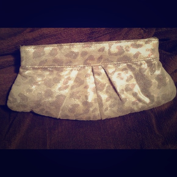 Animal print gold tone clutch. Very cute purse. - Picture 1 of 2