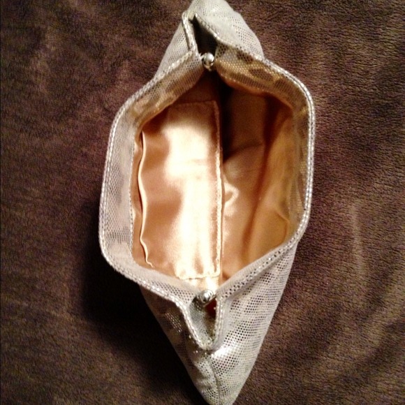 Animal print gold tone clutch. Very cute purse. - Picture 2 of 2