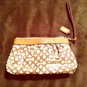 On sale today only $25 Authentic Coach pouch.