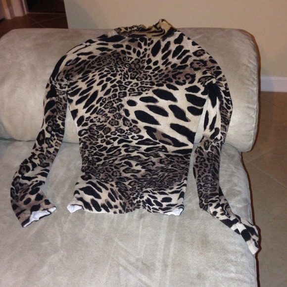 Sold.  Leopard turtleneck cache