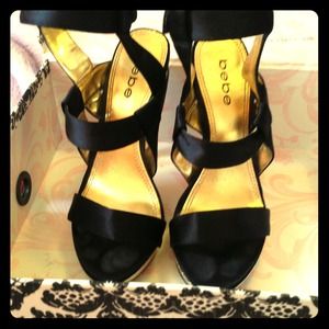 Bebe black and gold heels