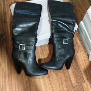 Brand new black leather boots