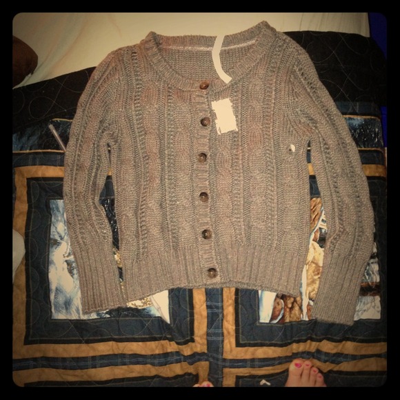 Gray sweater.