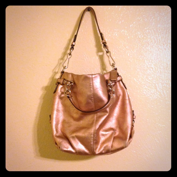 Rose gold coach purse