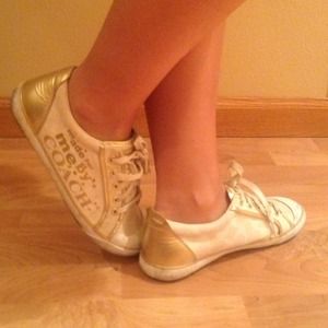Authentic Coach gold low top sneaker