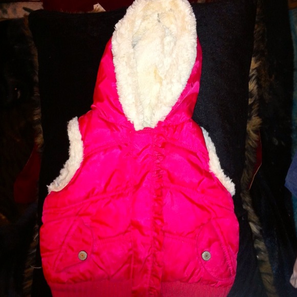 Pink sleeveless vest
