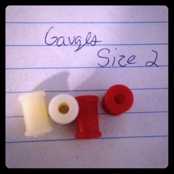Size 2 gauges. Red and white.