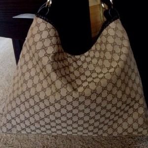 Gucci Hobo Handbag.