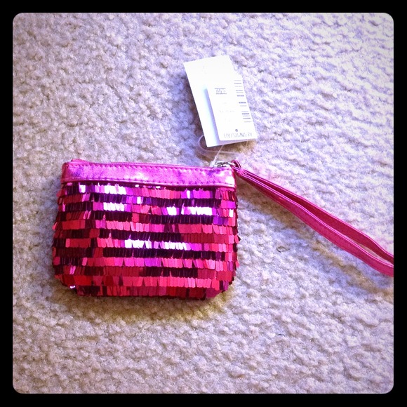Magenta small clutch or change purse.