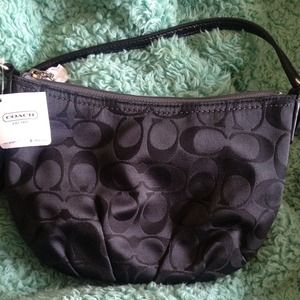SOLD! Small black cross body coach purse