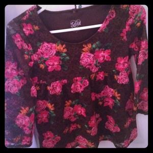 Floral blouse. Never worn. No tags but brand new.