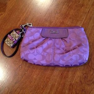 Authentic purple coach wristlet! No trades