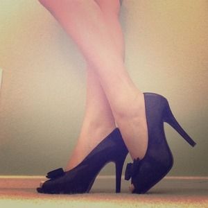Black high heels with bow
