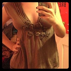 Tan top w/ flowers and plunge neckline