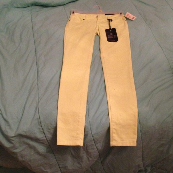 Bright yellow skinny jeans