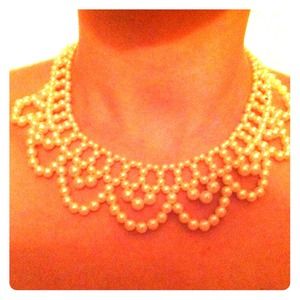 Tiered pearl necklace.
