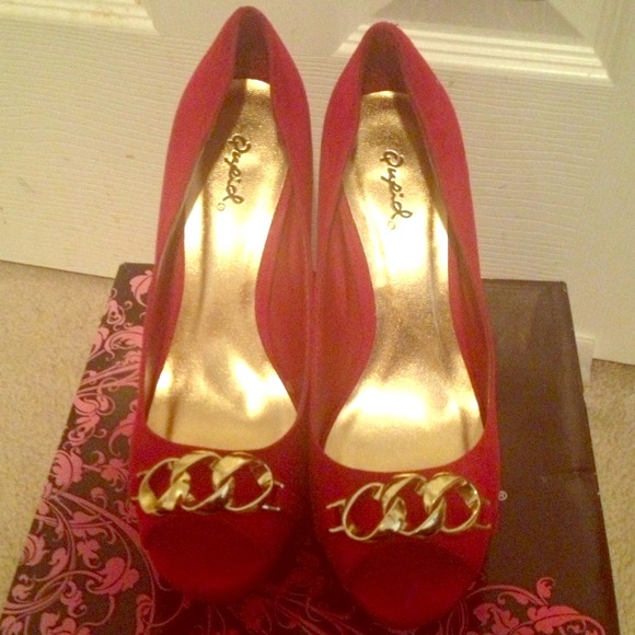 Red peep toe stilettos