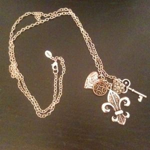 Fleur de lis long chain necklace