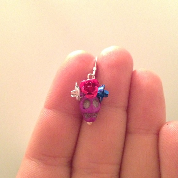 Purple skull earrings. sterling silver wire &hook.