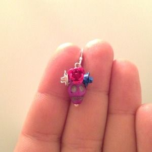 Purple skull earrings. sterling silver wire &hook.