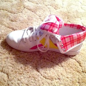 White & pink reeboks.