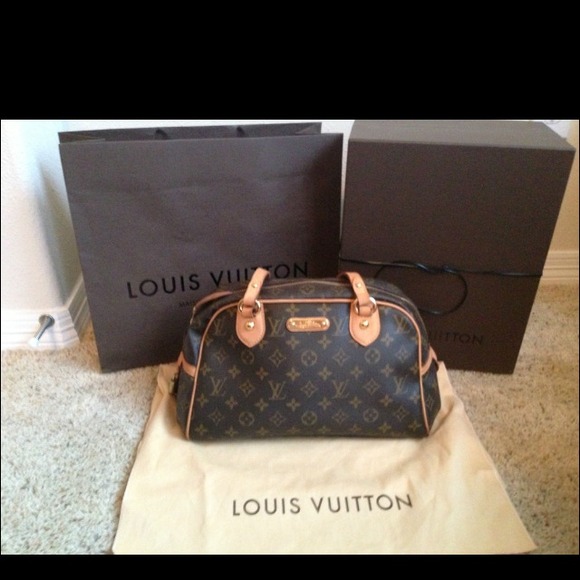 SOLD:authentic Louis Vuitton montorguiel pm