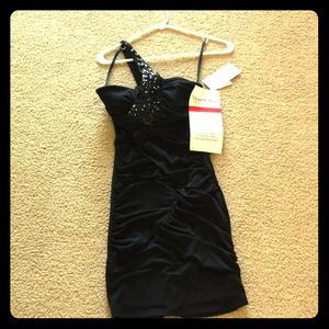 One should black ruffled cocktail dress