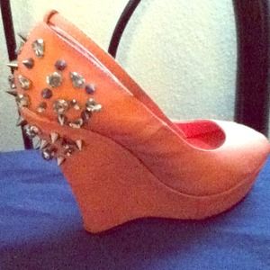 Baby pink, spiked, wedged heels