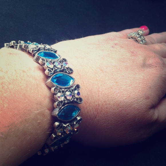Stretch jeweled silver tone bracelet