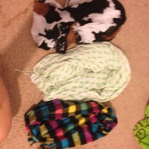 Three scarfs one never worn and incredible cute