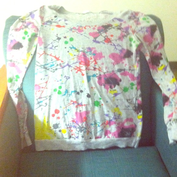 Long sleeved paint splattered shirt.