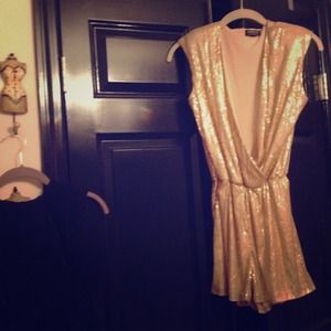 Gold romper..sz small, deep vneck