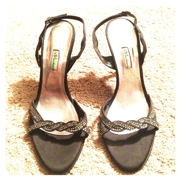 Black stiletto heels with jewel detailing.