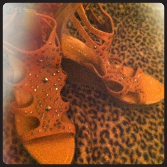 Studded gladiator wedges.