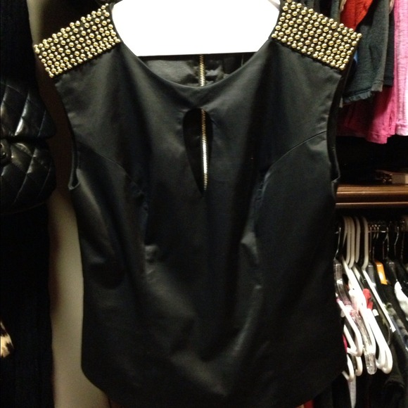 * SOLD * -New BEBE top with studded shoulders.