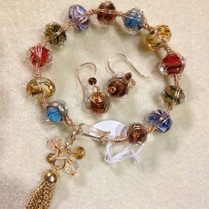 Juego de pulsera y zarcillos...