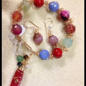 Juego de pulsera y zarcillos..