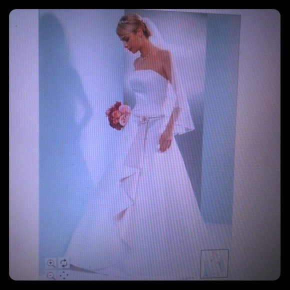 New wedding dress w slip. Never altered or worn.