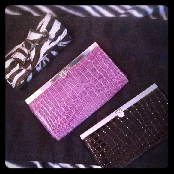 Like new patten faux leather wallets